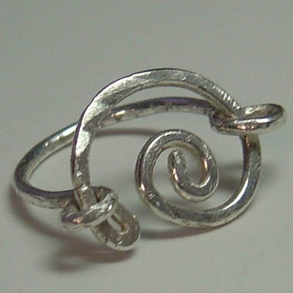 "Natalie" in hammered sterling.