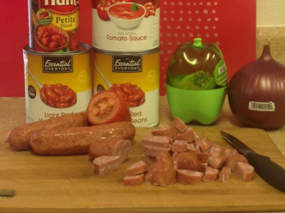 Need German sausage, beans (any pinto, navy, your choice), canned diced tomatoes & canned tomato sauce, diced fresh whole tomato, diced 1/2 whole onion & diced whole fresh green pepper.