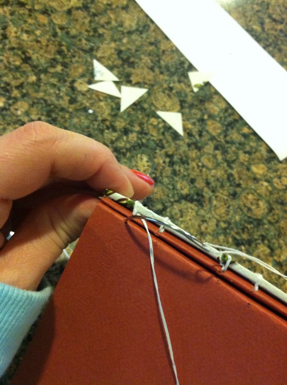 needle through the outside of the first station on left