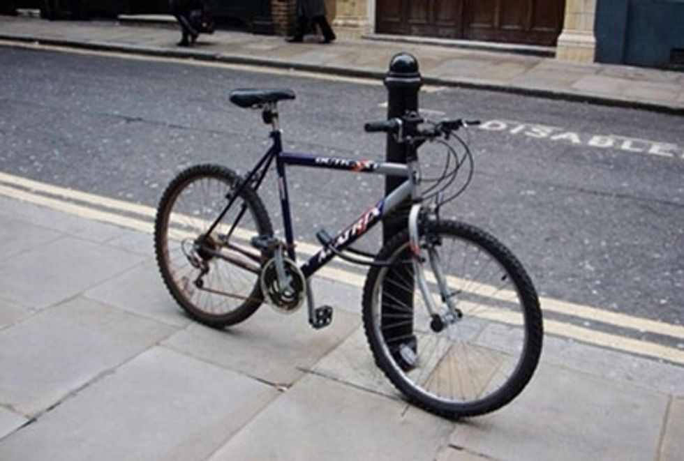 Never: Lock your bike to an object that it can be lifted over (thieves have been known to remove sign posts to get to bikes).