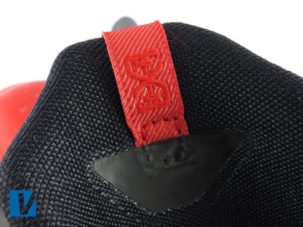 New LeBron 11's have a tab on the back of the tongue with the letters "XI" embroidered into it. Check the quality of the embroidery as well as the glued finish of the tab attachment to the tongue.