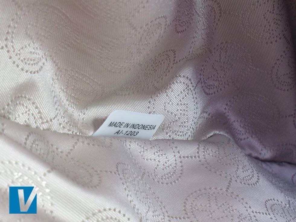 New Michael Kors handbags feature a 'Made in...' tag. Older handbags may not feature this tag or state different countries of origin.