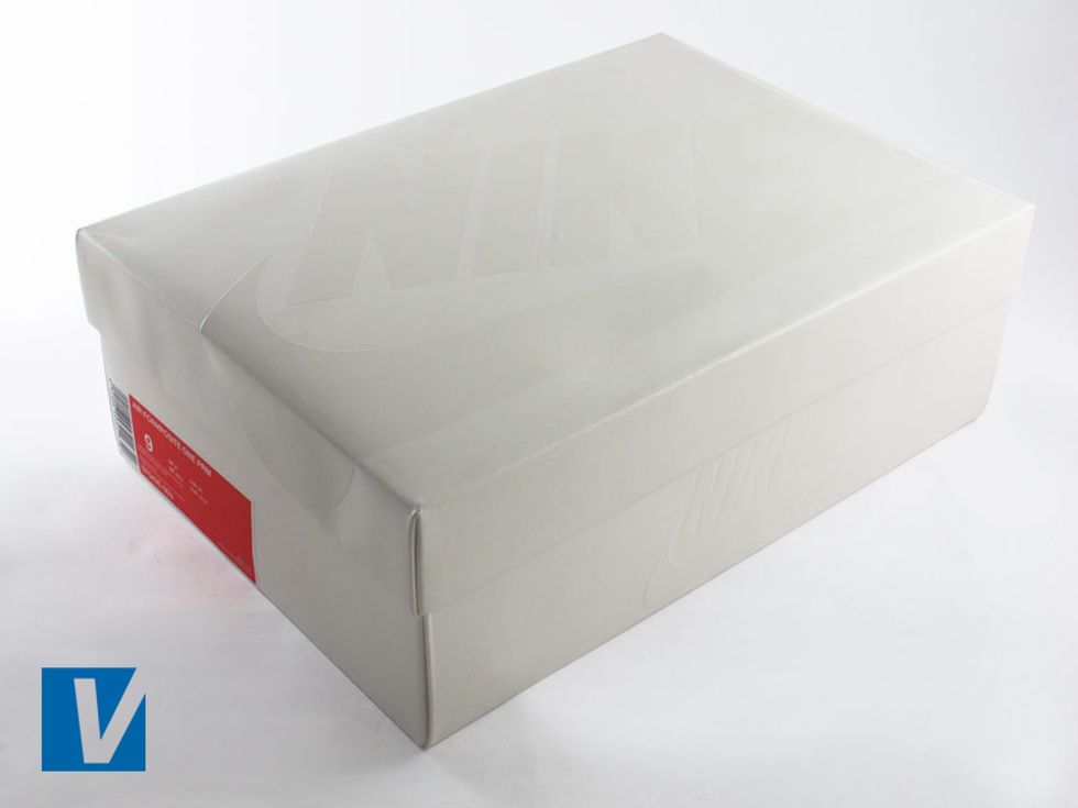 New Nikes are boxed in a strong shoe box usually featuring the logo on the lid and side. Colour and style of box varies according to style and year. Remember real shoe boxes can accompany fake shoes.