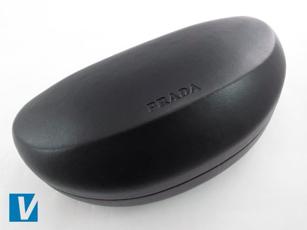 New Prada sunglasses are accompanied by a carry case which will vary with model and year. Check that the logo and font used matches that of used officially by Prada.