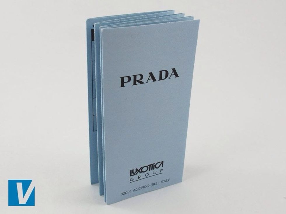 New Prada sunglasses are accompanied by an information booklet. Check the size, font, spacing, positioning and alignment of the logo and other copy.