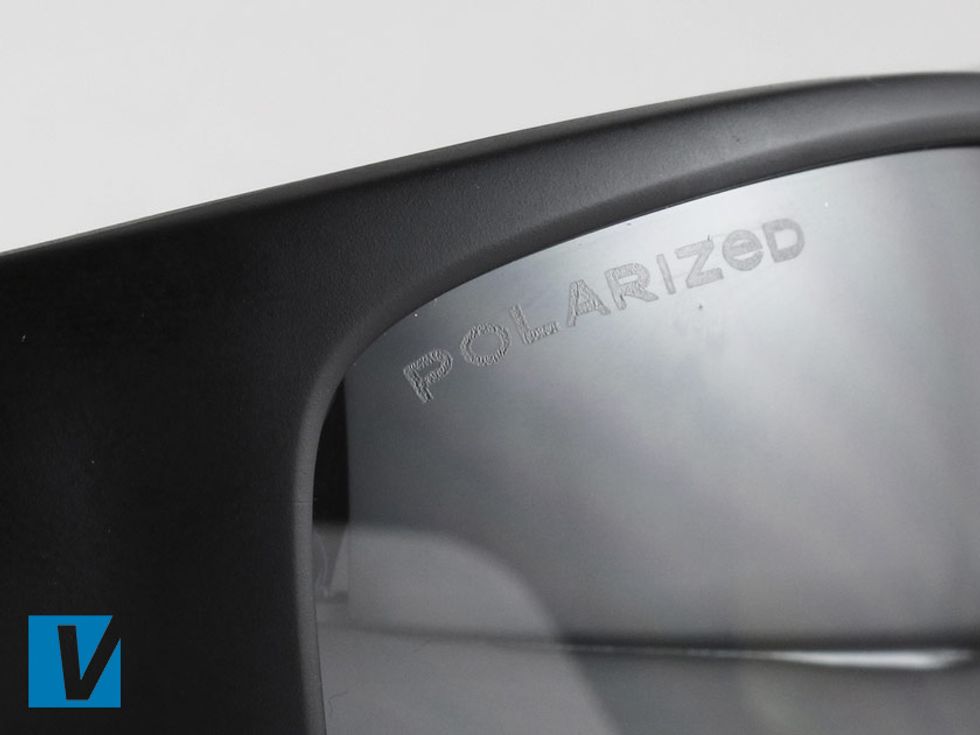 New Revo sunglasses featuring polarized lenses feature the word Polarized etched on the right lense. Check that the letters have sharp clean edges.