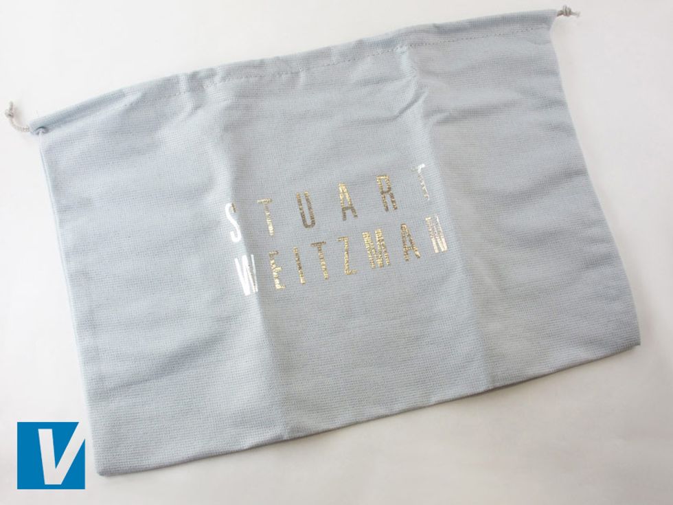 New Stuart Weitzman heels are accompanied by a branded dust bag. This most often features a silver 'STUART WEITZMAN' logo all in capital letters in the centre.