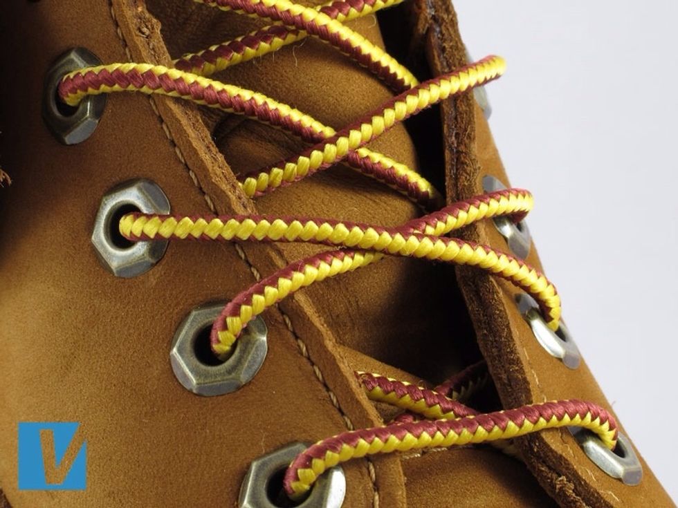 New Timberland lace tip ends should be burnt and not tipped with tape or plastic. Men's boots have 7 lace eyelets and women's have 6. All will be cleanly fixed to the upper.