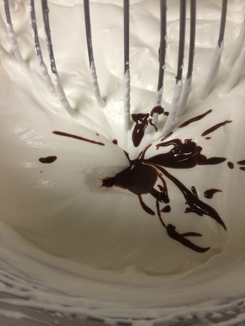 Next 4 cups of milk chocolate peanut butter ganache is added.