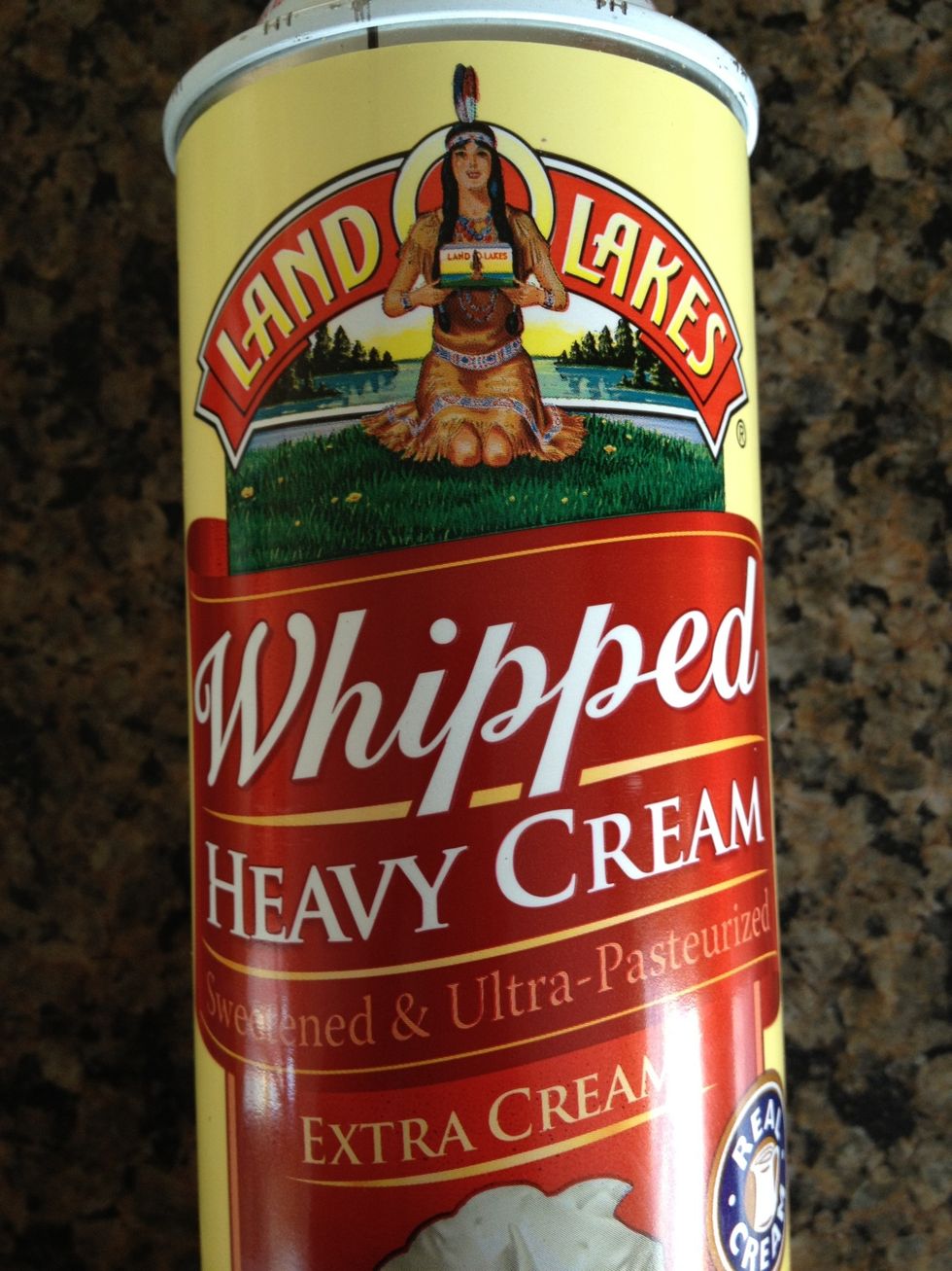Next, acquire whipped cream in a game of chance or a store. I had no idea Indian culture made aerosol cream but here it seems Pocahontas is quite skilled! (trivia fact - 2 'Q's were used in this step)
