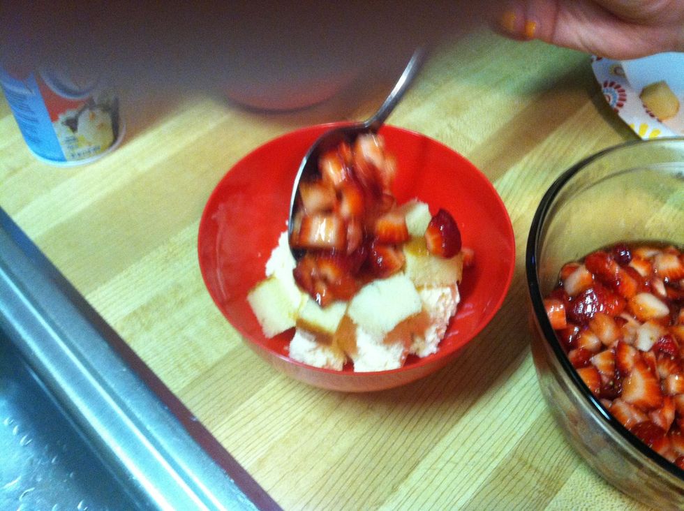 Next, add 2-3 spoonfuls of strawberries and some of the juice into the mix! PS, can you tell the boyfriend took this pic?! His are always blurry! And he's got his finger over the lens! Sorry!