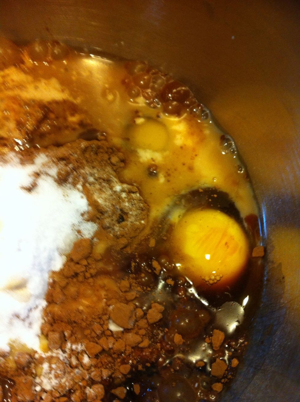 Next add 2 eggs, your milk mixture, 1 cup coffee, 2 tsp vanilla and 1/2 c vegetable oil.