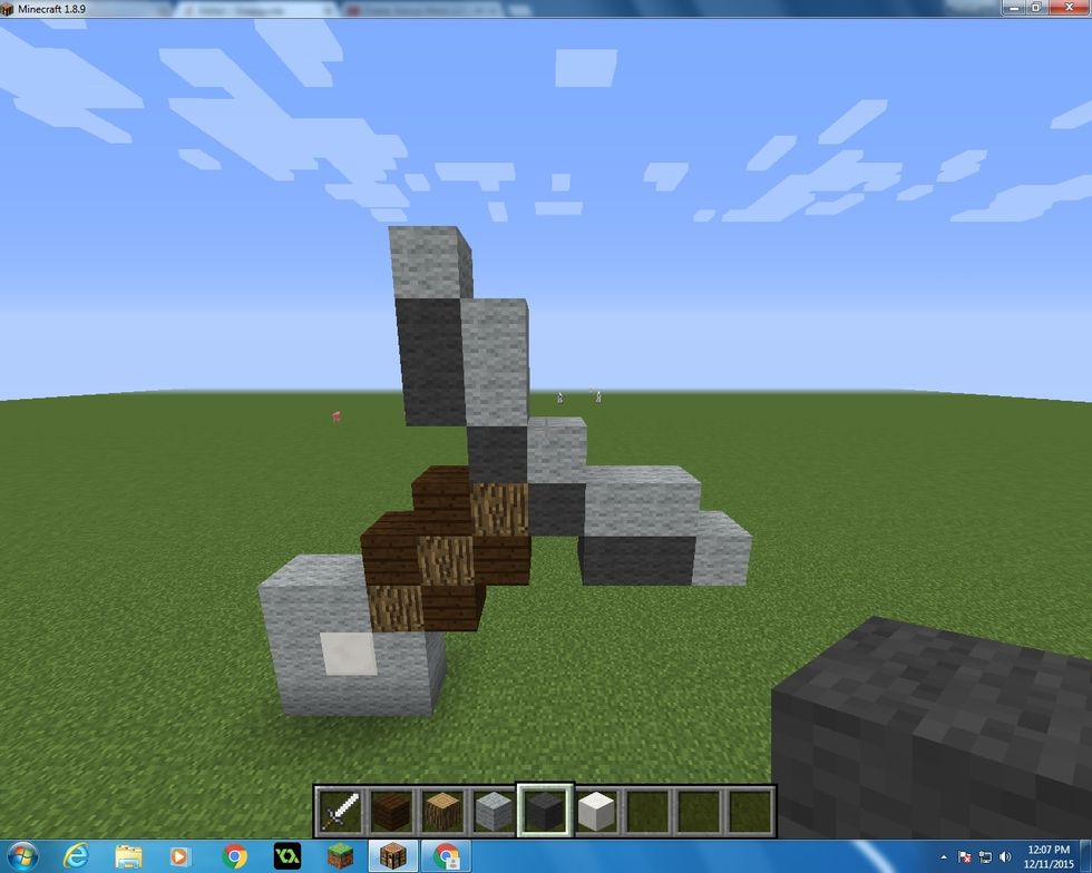 Next add 2 more Light Grey Wool Blocks and 4 more Grey Wool Blocks.