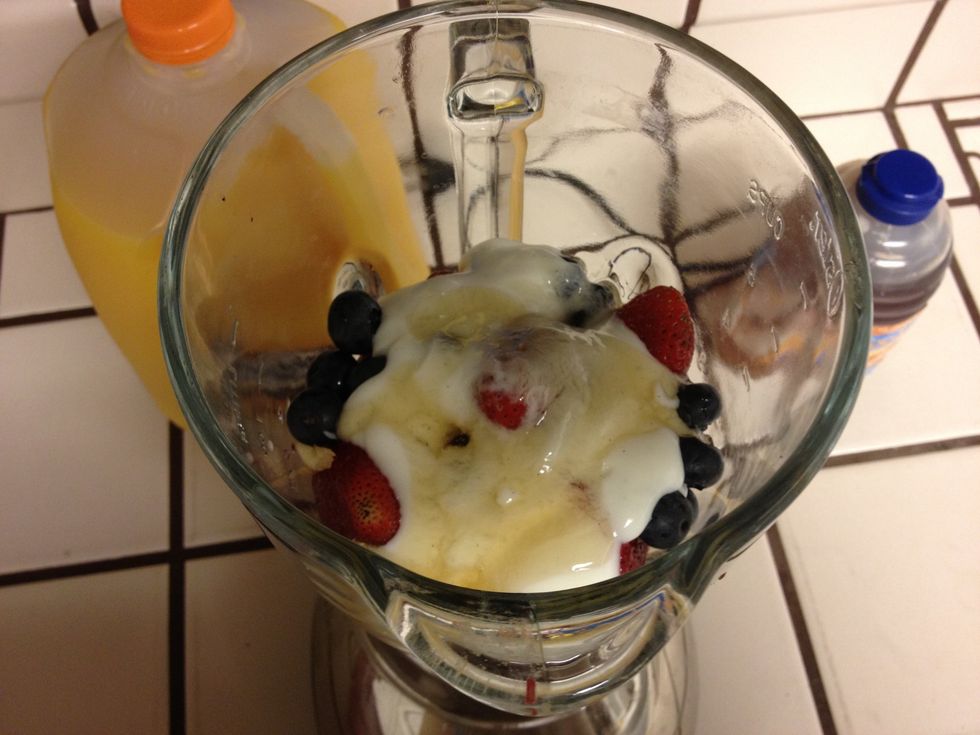 Next add 3 tbsp of vanilla yogurt and 1 tbsp of honey