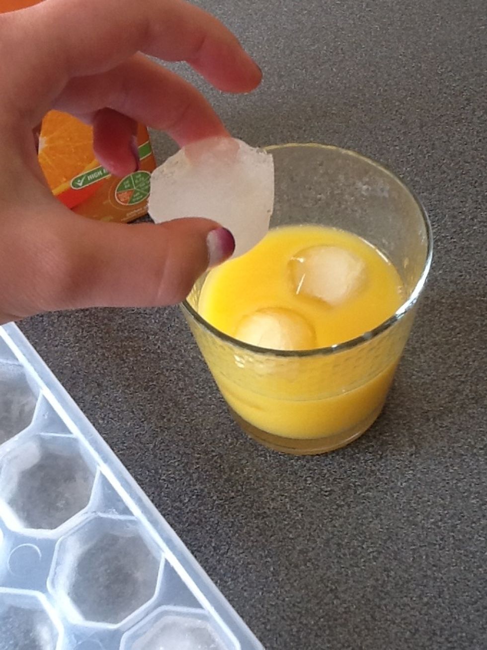 Next add 4-5 ice cubes and mix some more!