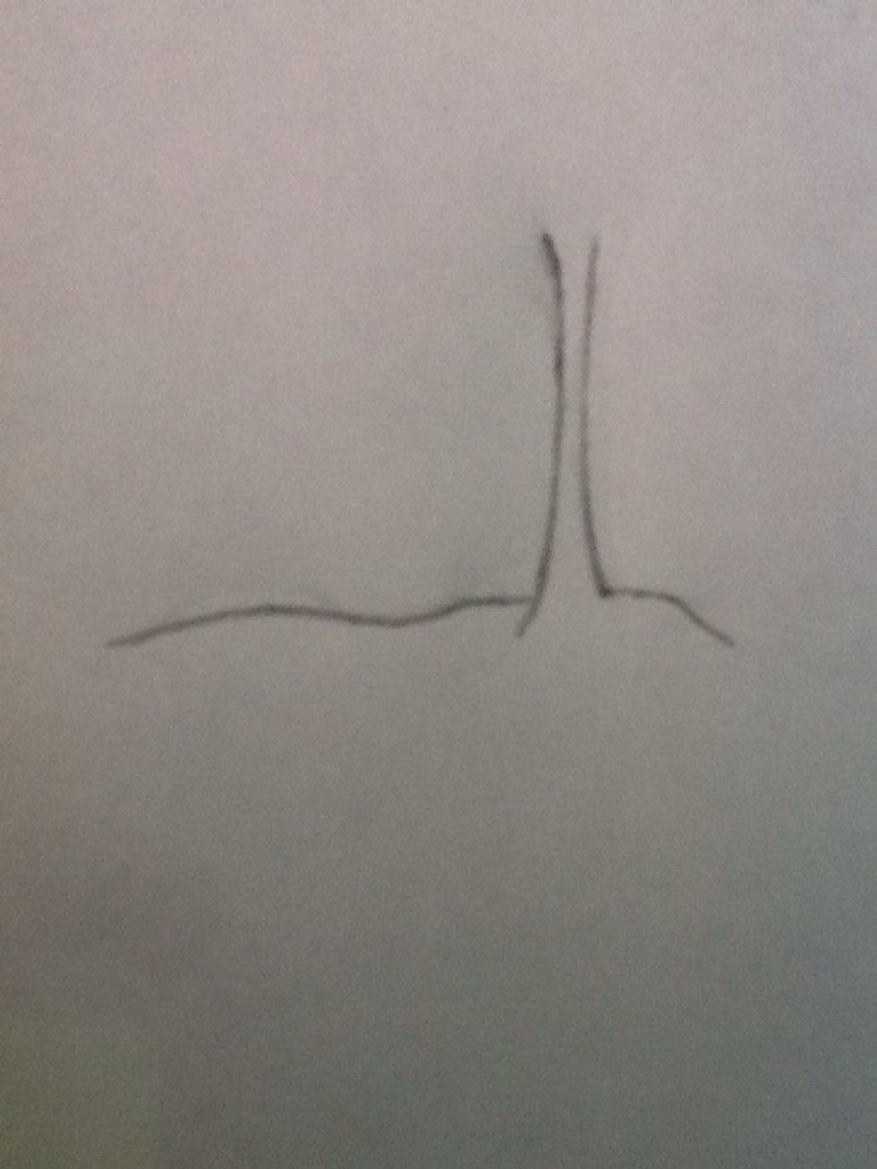 Next, add a line that connects to start the mouth.