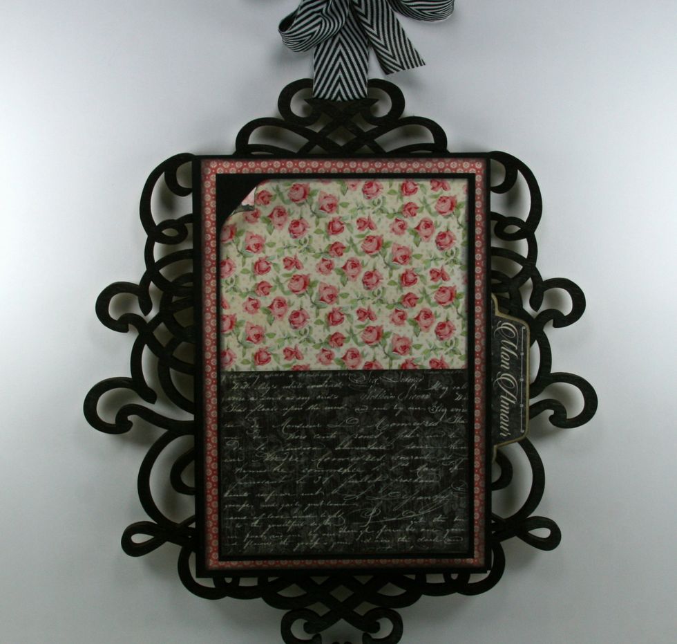 Next add an additional layer of patterned paper to the bottom half of center section.