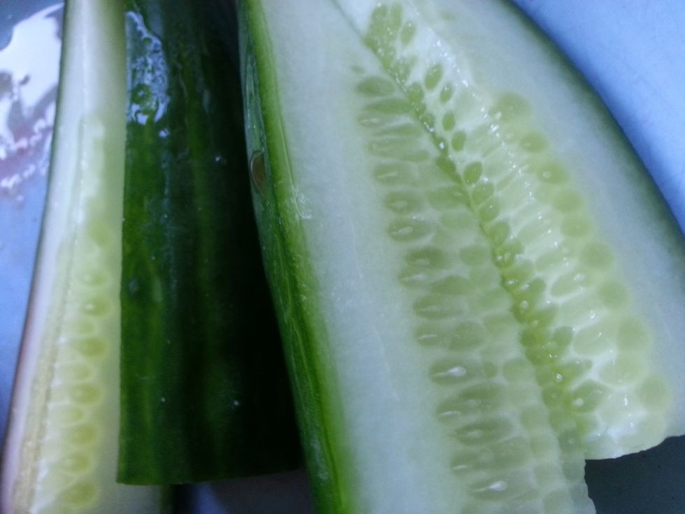 Next add cucumber to the juicer.