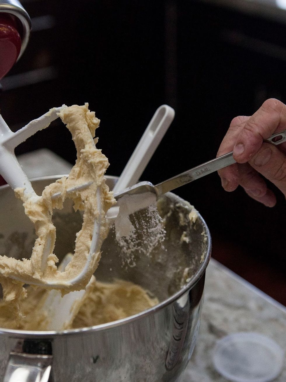 Next, add in the Baking Powder. Keep scraping down the sides of the bowl.