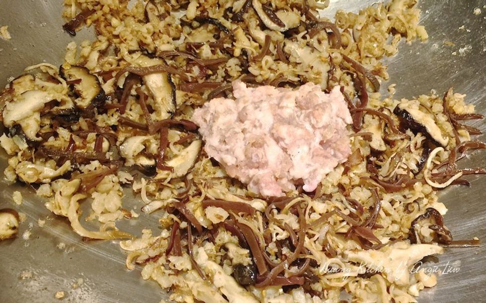 Next add in the minced meat and fry for about 5 minutes or until the meat is cooked.