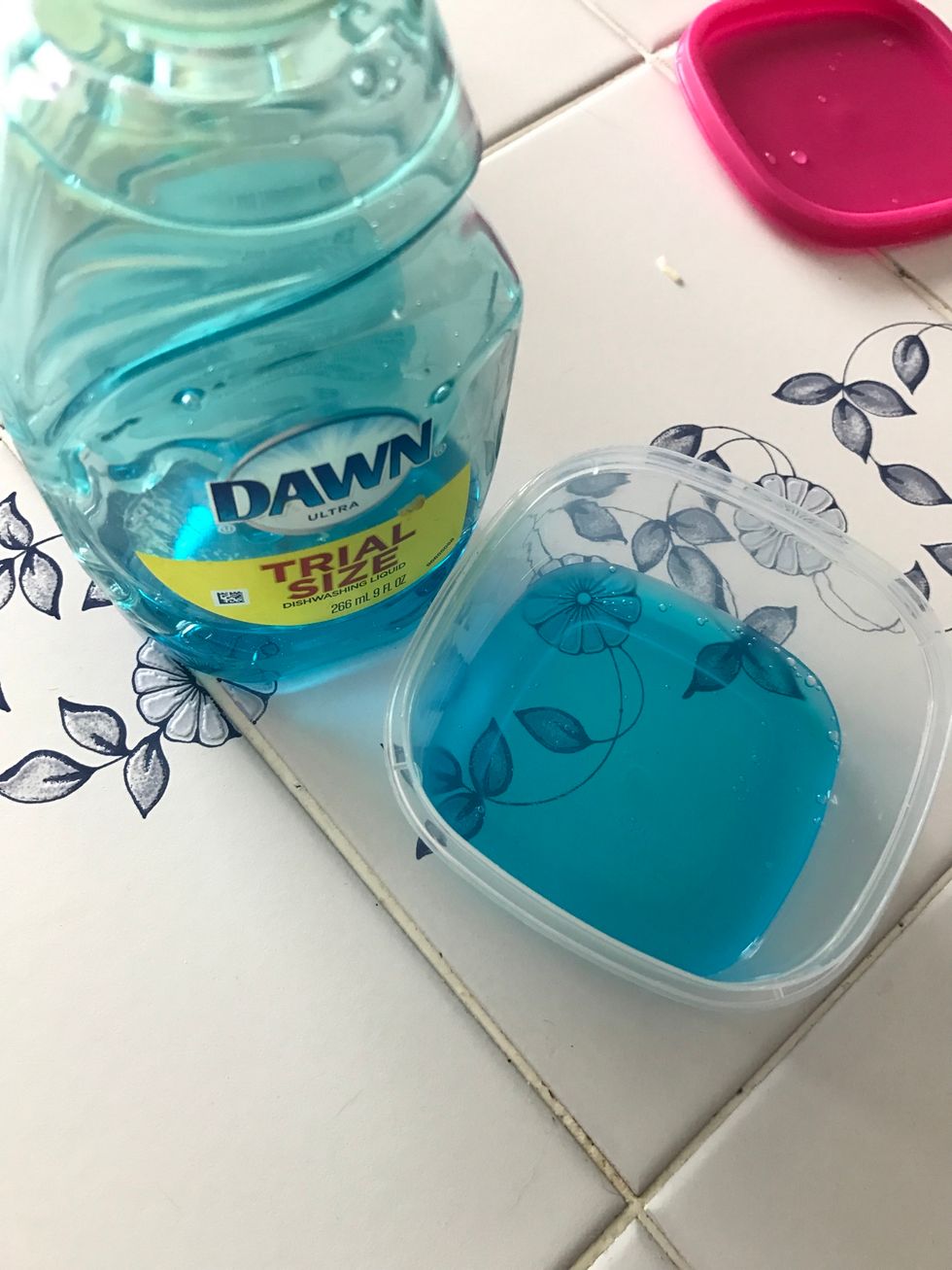 Next add some dish soap or hand soap into a container