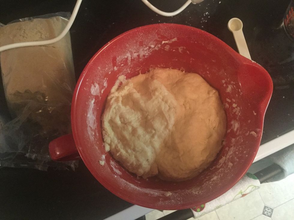 Next add the 4 1/2 cups of flour and the 1 1/2 teaspoons of sea salt and mix until the dough lifts from the sides of the bowl.