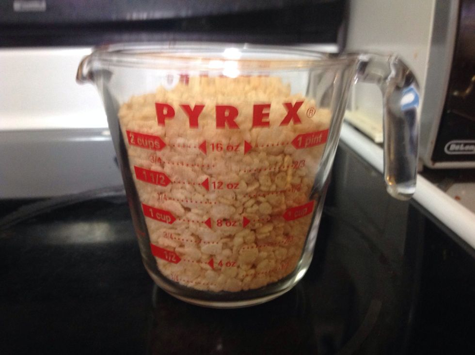Next, add the 5 cups of Rice Krispies.