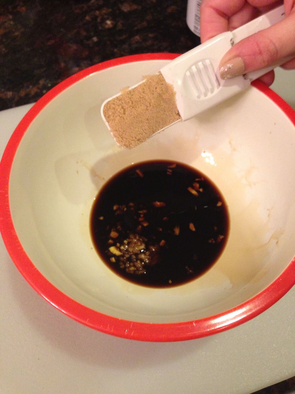 Next, add the brown sugar. The salty and sweet notes from the soy sauce and brown sugar work very well together in this sauce.