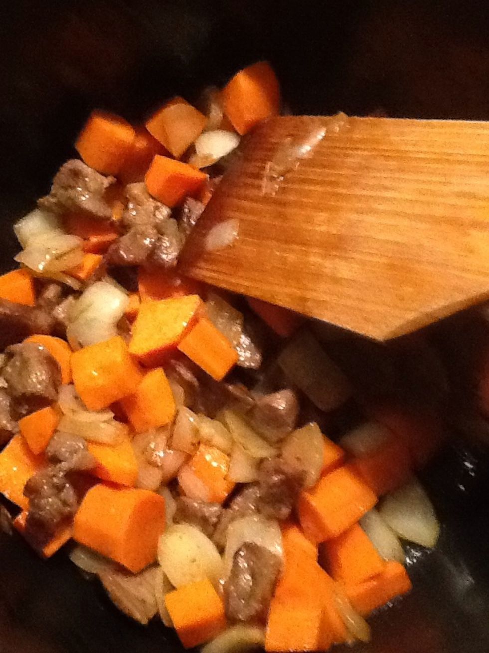 Next add the carrots and fry for a few more minutes