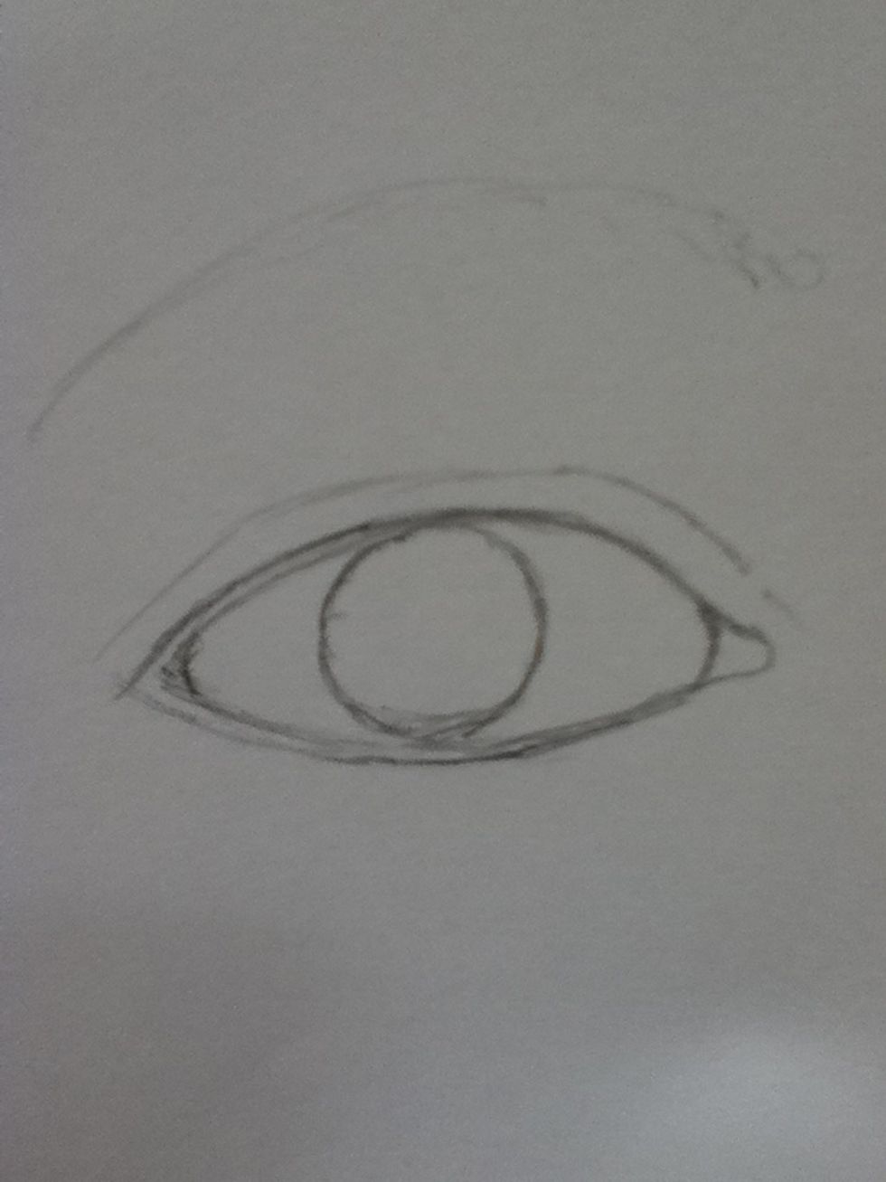 Next, add the eyeball inside by making arches on either side of the form from step 1, add the cornea as well (only the basic part of the inner eye)