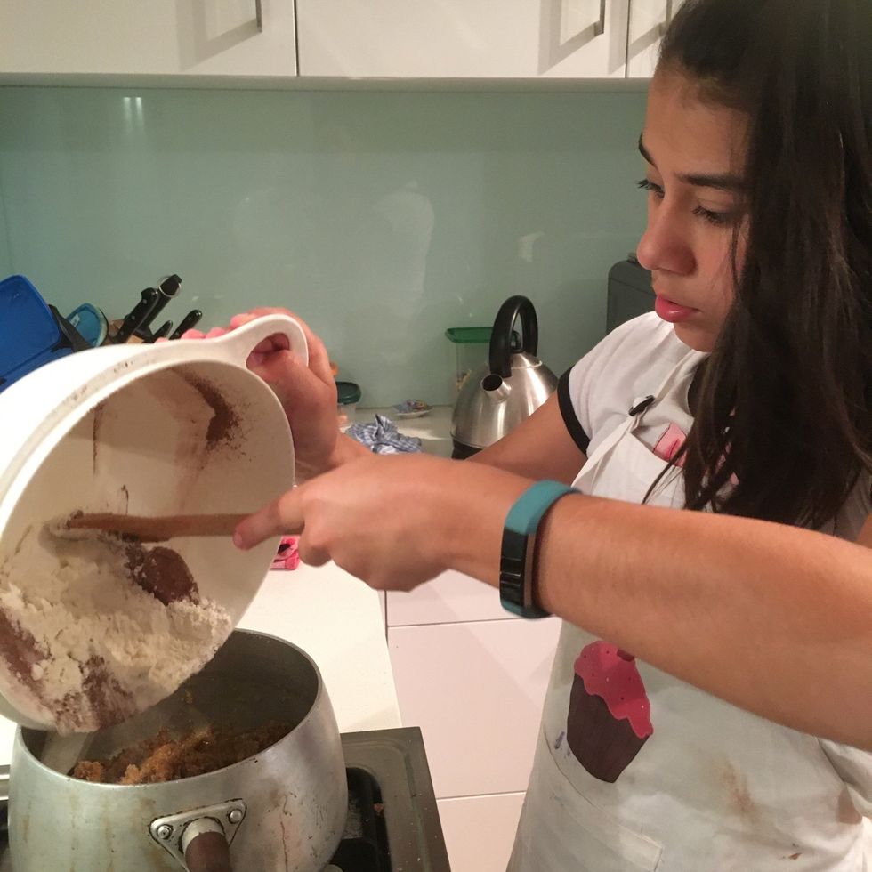 Next add the plain flour, self raising flour and cocoa to the mixture. Mix until well combined.