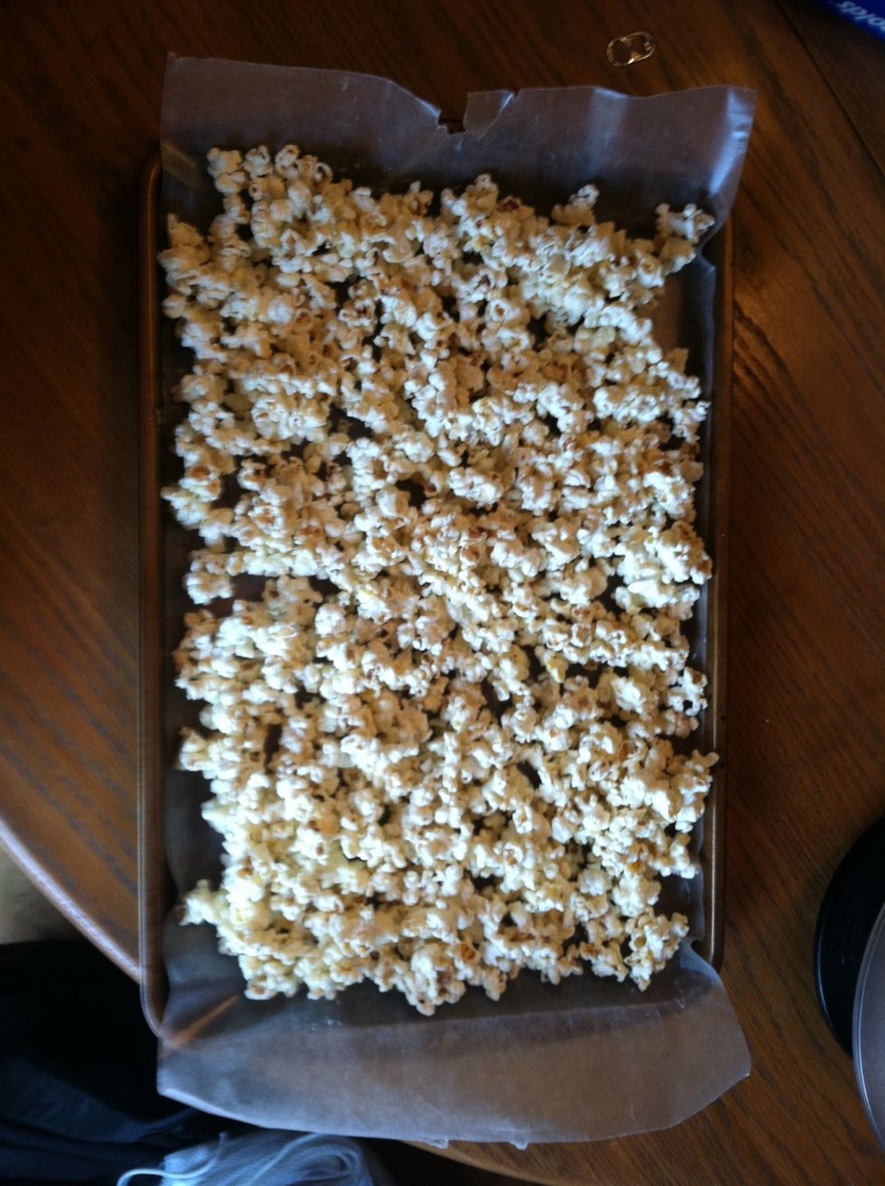 Next add the popcorn. The wax was to make sure that when the popcorn dries it won't sticking the sheet