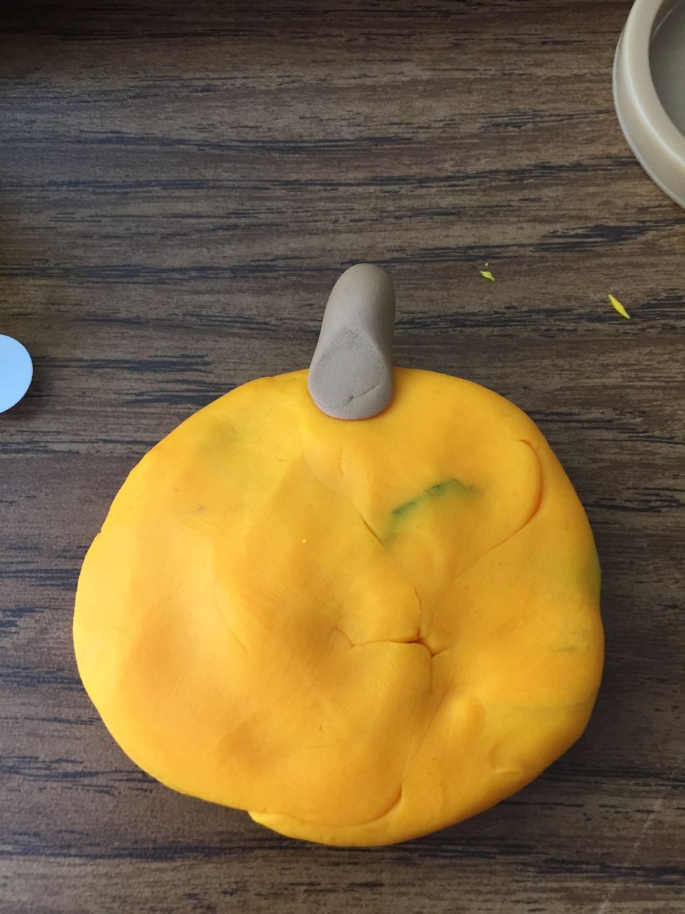 Next add the stem to the top of the pumpkin.