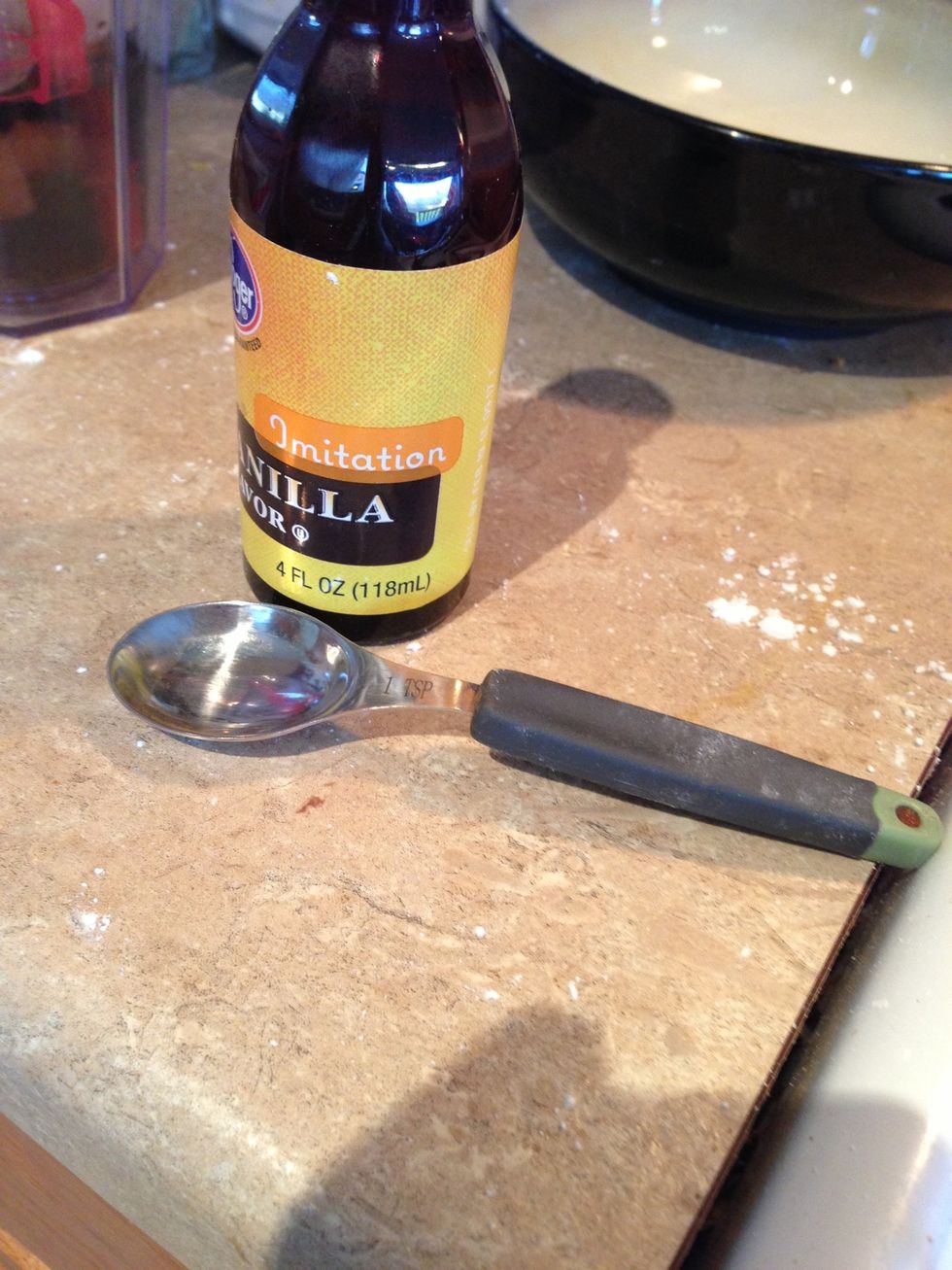 Next add the Vanilla Extract. By pouring over the Confectioners Sugar.