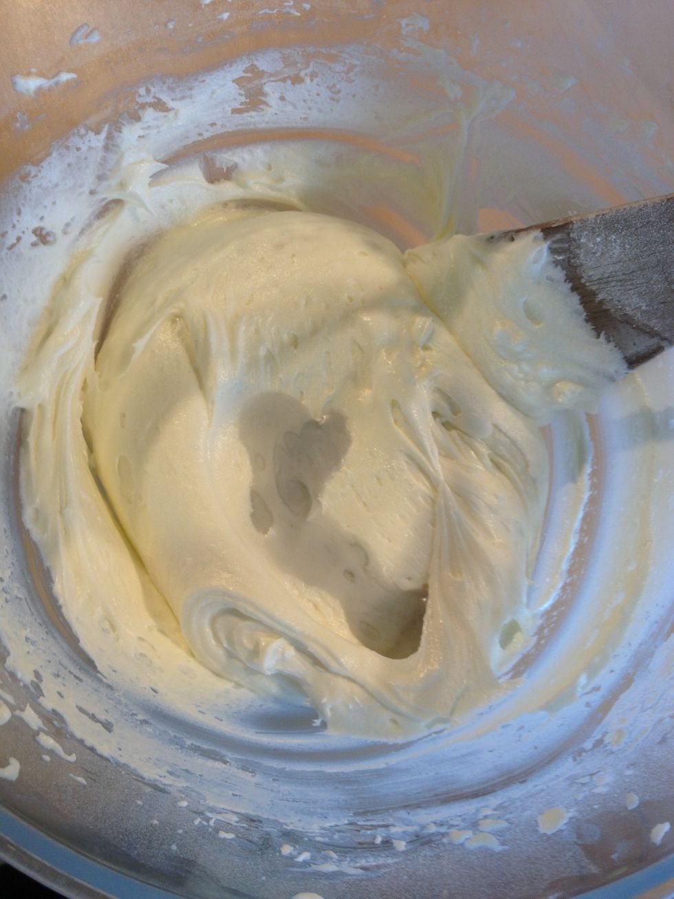 Next add the violet syrup to taste. You can also add food colouring if the syrup doesn't change the colour of your icing.