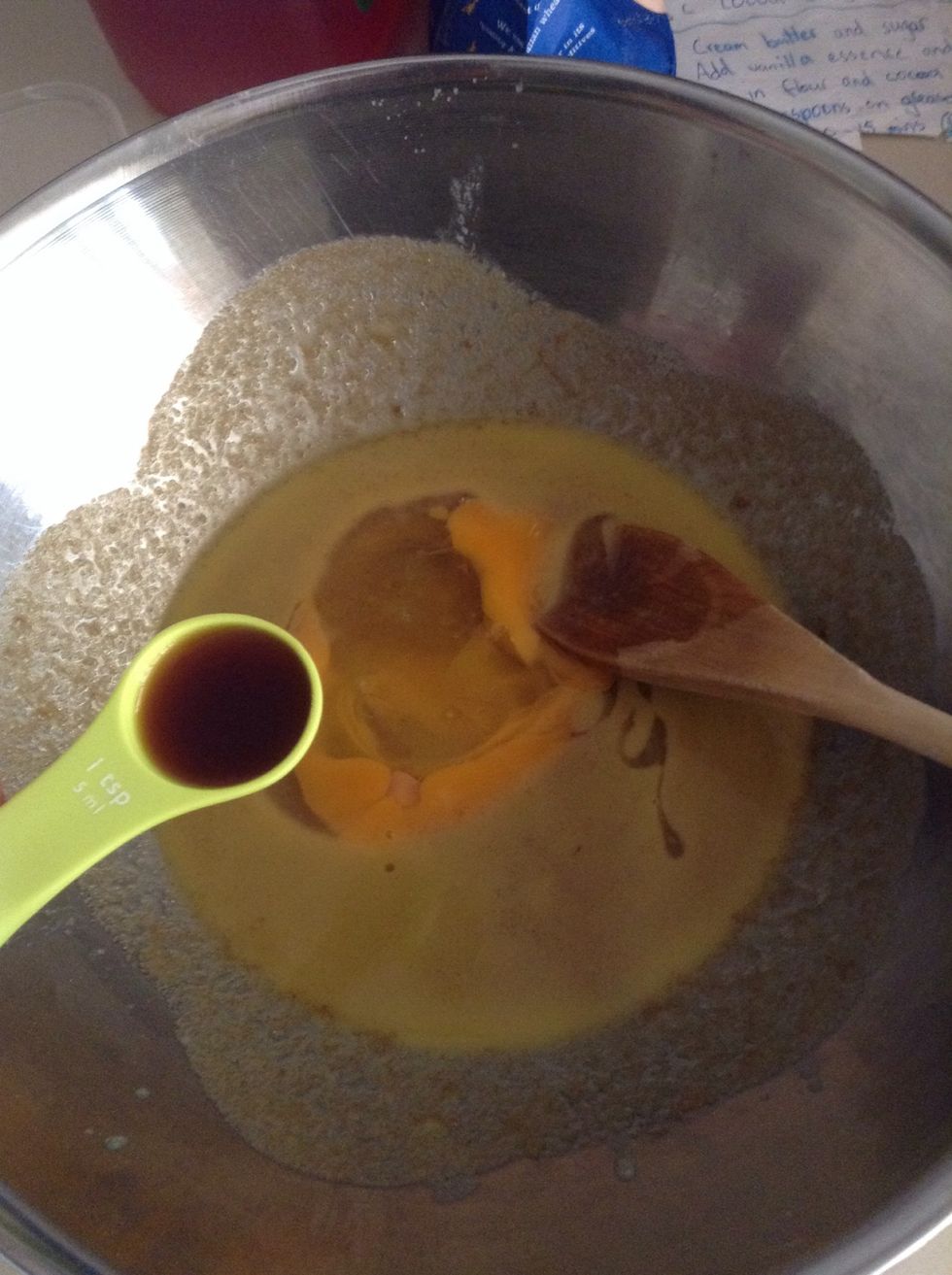 Next add vanilla essence and your egg and mix!