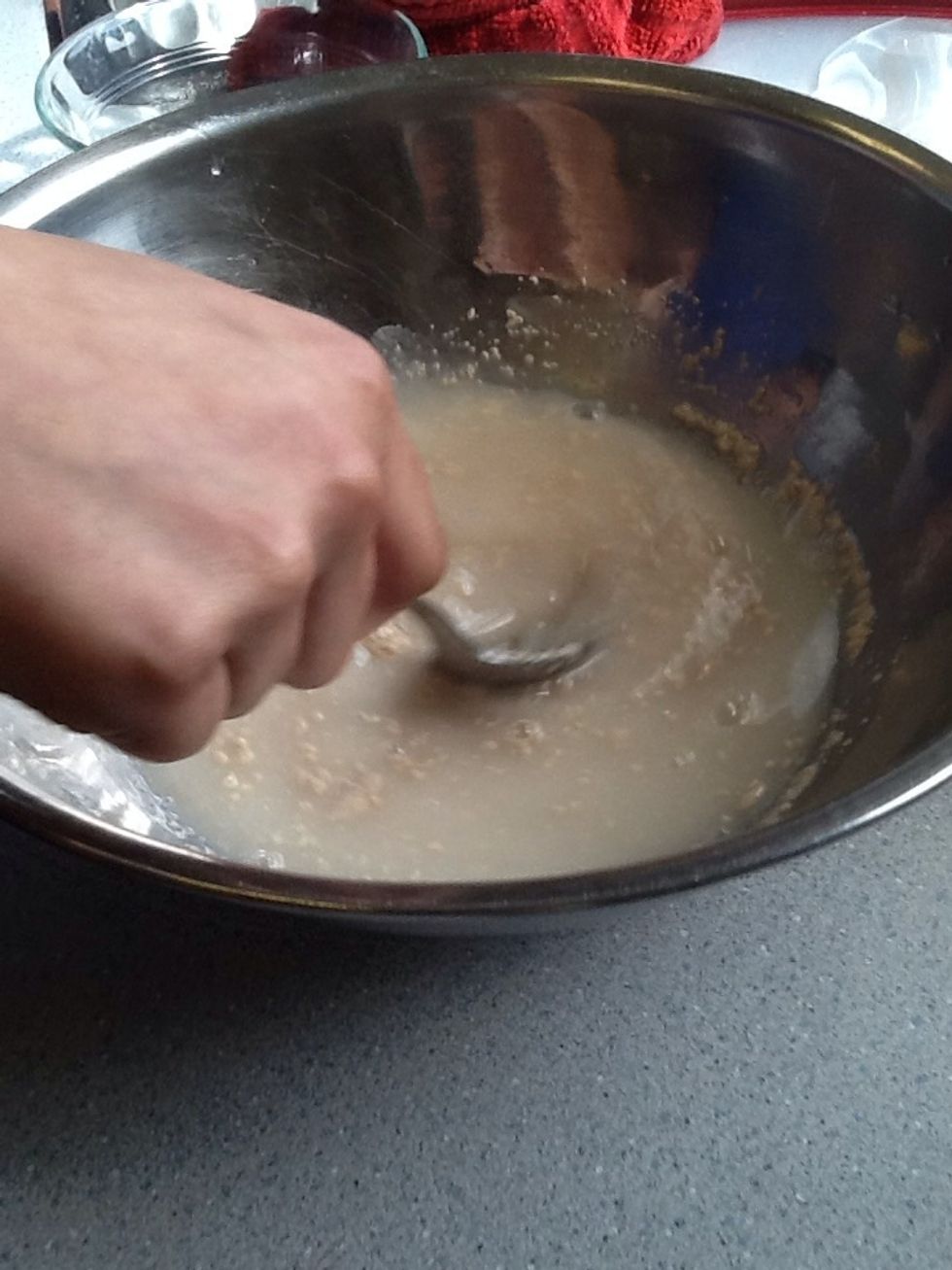 Next, add water, yeast, and sugar in a small bowl and stir lightly.