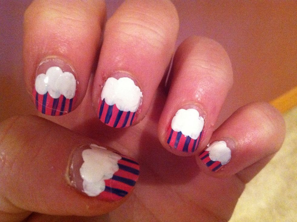 Next, add white 'frosting' by dipping a bobby pin in white nails polish and doting it on your nails
