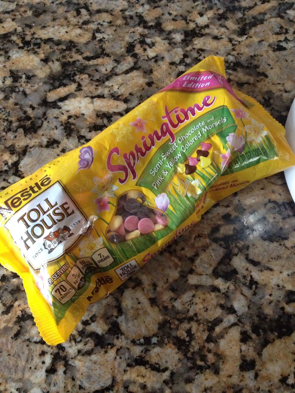 Next add your chocolate chips. I love the seasonal ones for spring but normally I use chocolate chunk and white chocolate. I use two bags