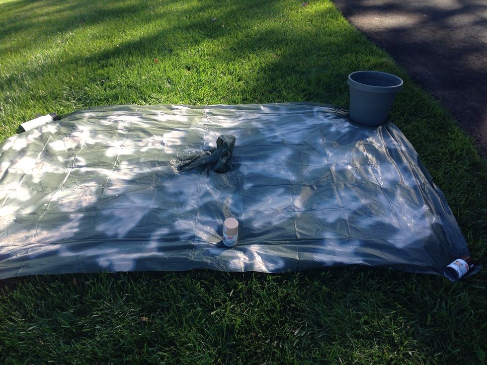 Next add your first color randomly. When you are done let it dry before applying the next color. You will need to check how long it takes your spray paint to dry.