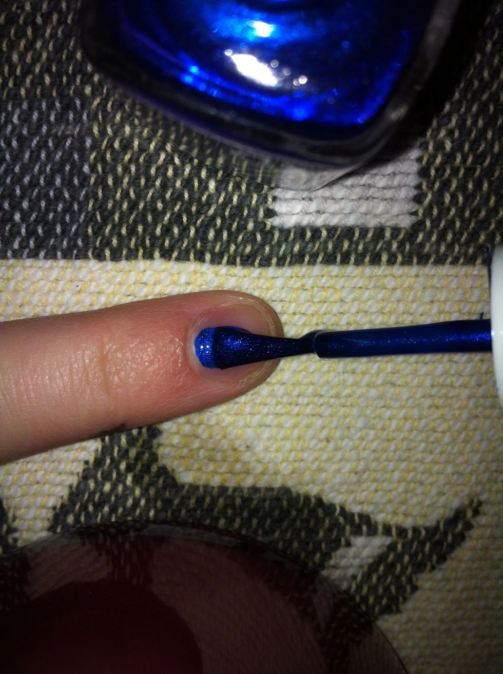 Next add your first layer of blue nail polish