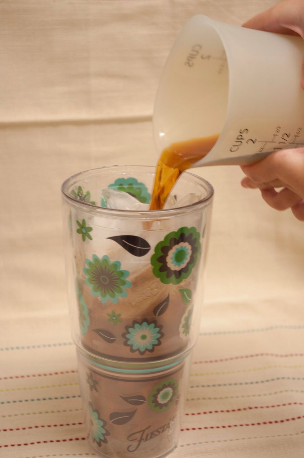 Next, add your freshly brewed coffee. Use regular, decaf or even flavored coffee.