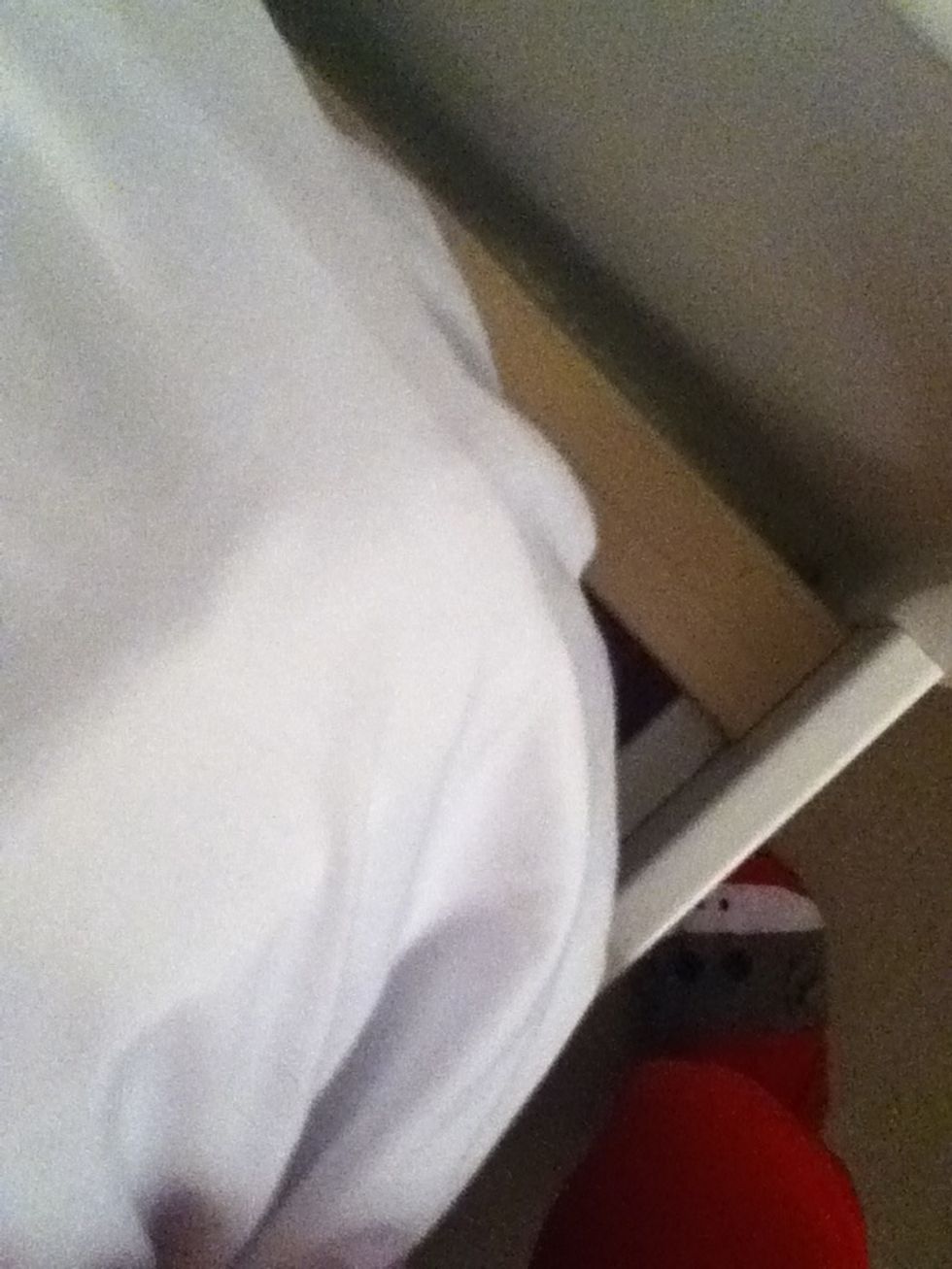 Next, add your loose fitting sheets. As you can see in the picture, I'm kind of lifting up the mattress. If this helps you to tuck them really well, you should deffinately do it.