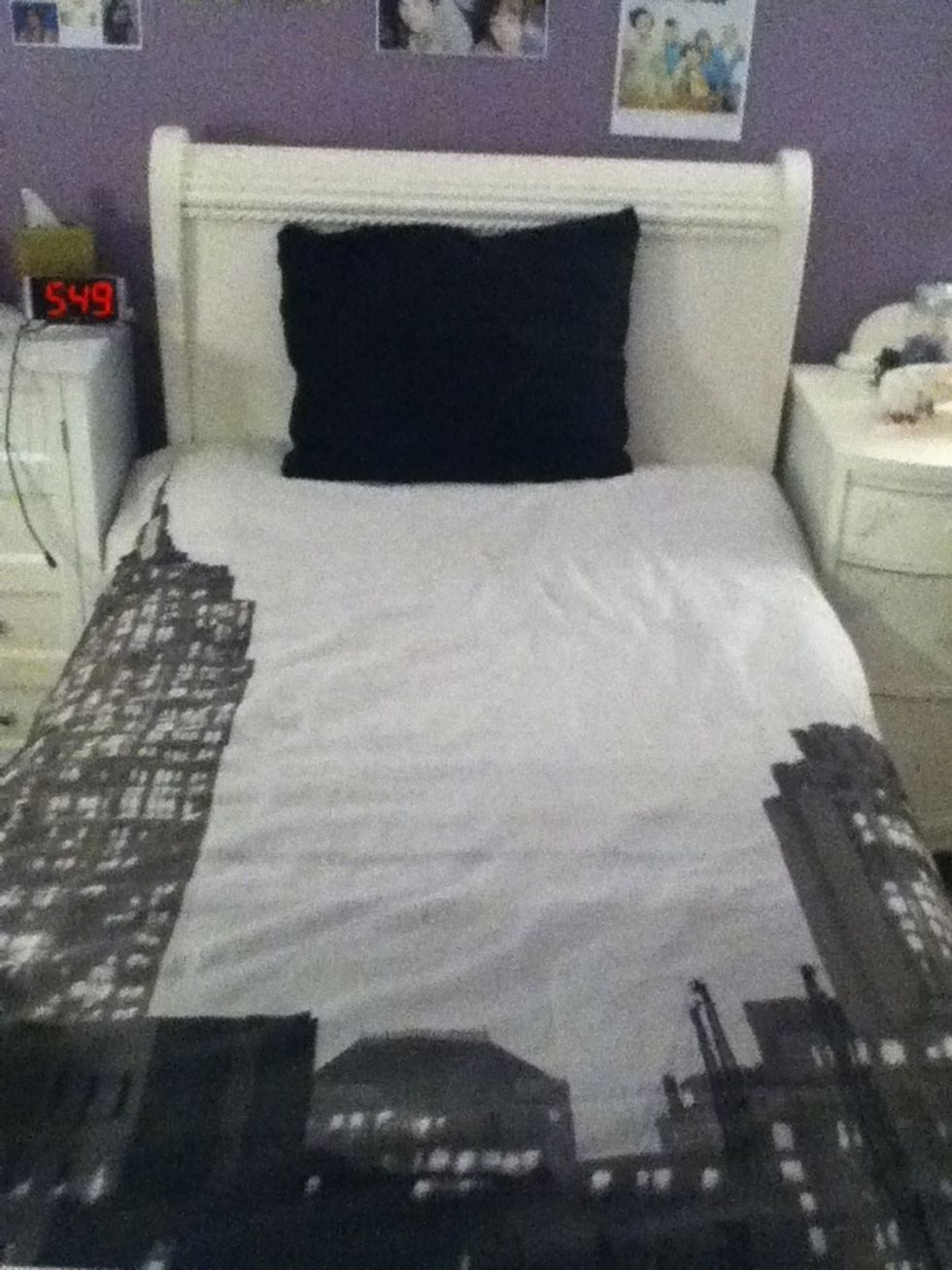 Next, add your regular pillows.