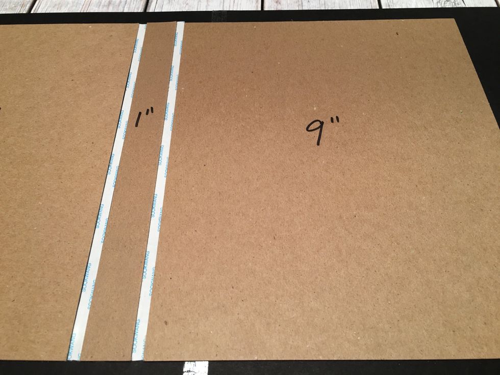 Next adhere one of the 9" chipboard pieces along the spacer tape as shown.