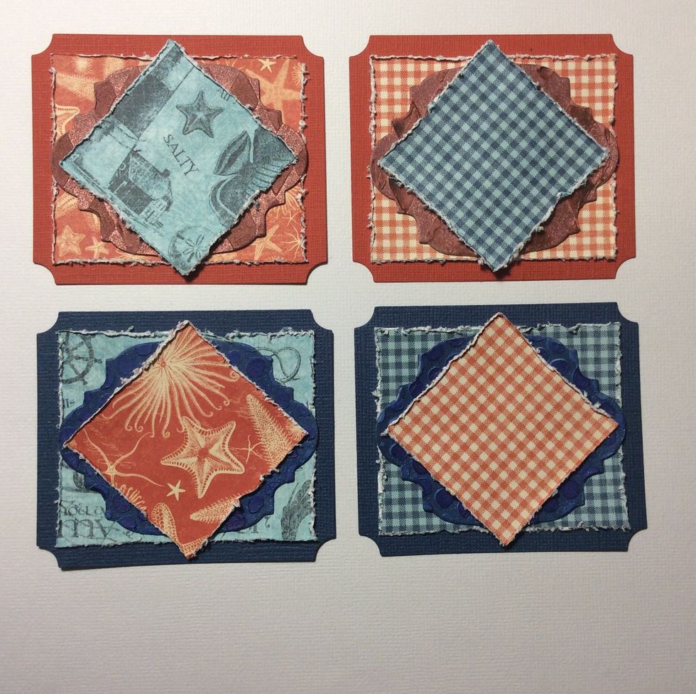 Next adhere the distressed squares in a diamond position.