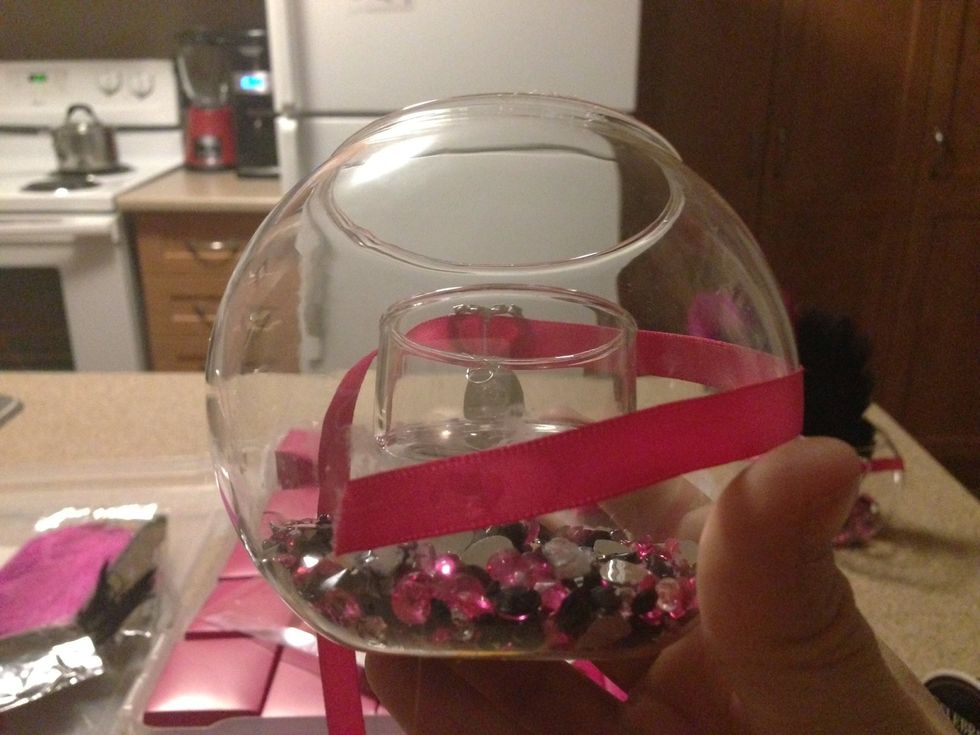 Next apply a small dab of hot glue to the ribbon and place it on the glass. **NEVER apply hot glue directly to glass**