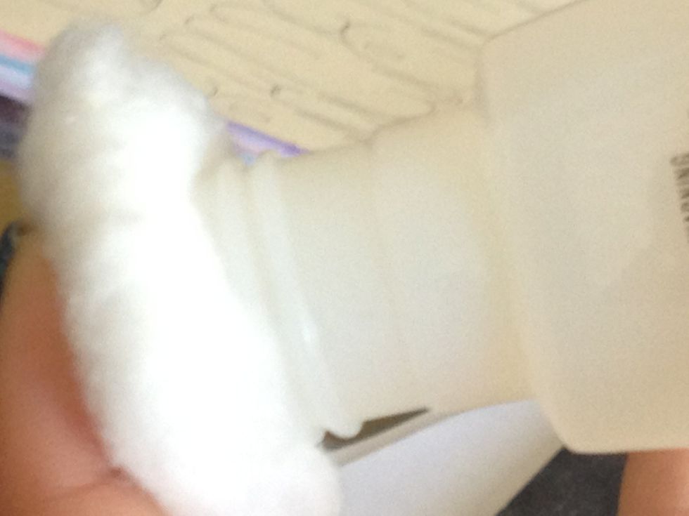 Next apply polish remover to one of your cotton balls.