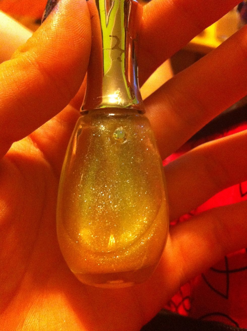 Next, apply two coats of a fine glitter. I believe this is a Hard As Nails color. I picked all the stickers off :/