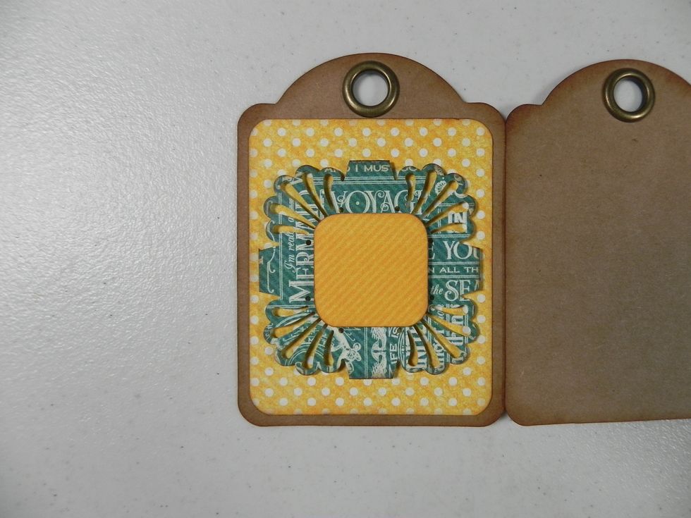 Next, attach the 1 x 1" piece, centered, using 3D foam squares or similar.